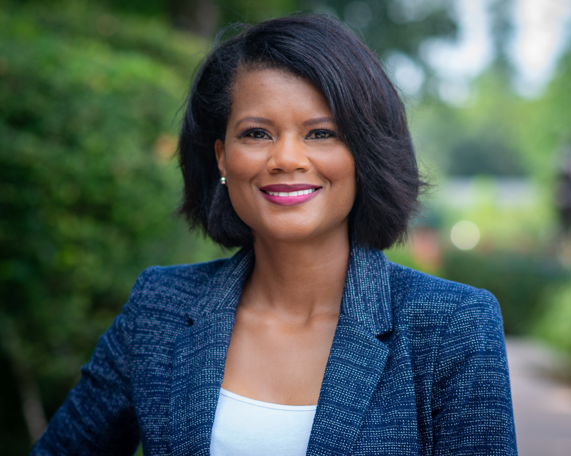 Outdoor professional headshot of a businesswoman