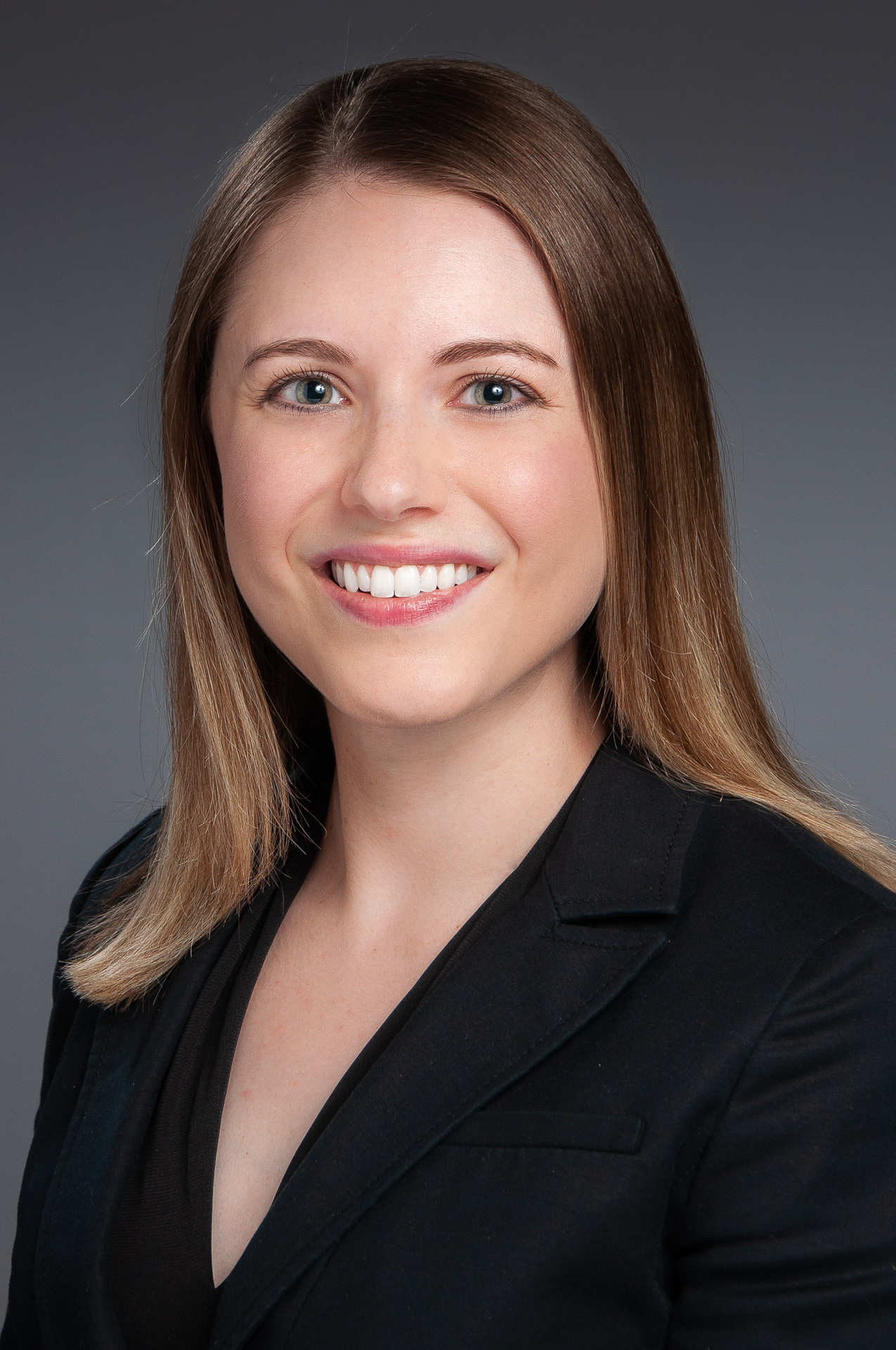 Executive headshot of a businessman in a suit