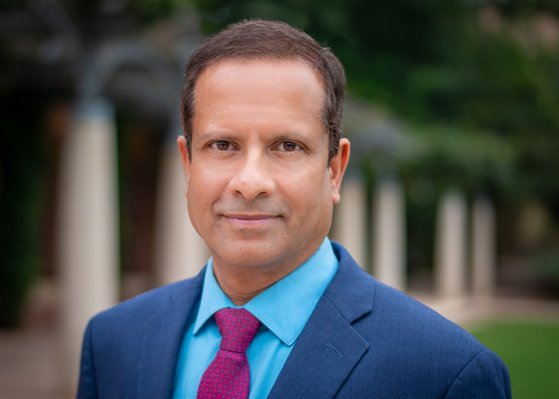 Outdoor executive headshot of a businessman